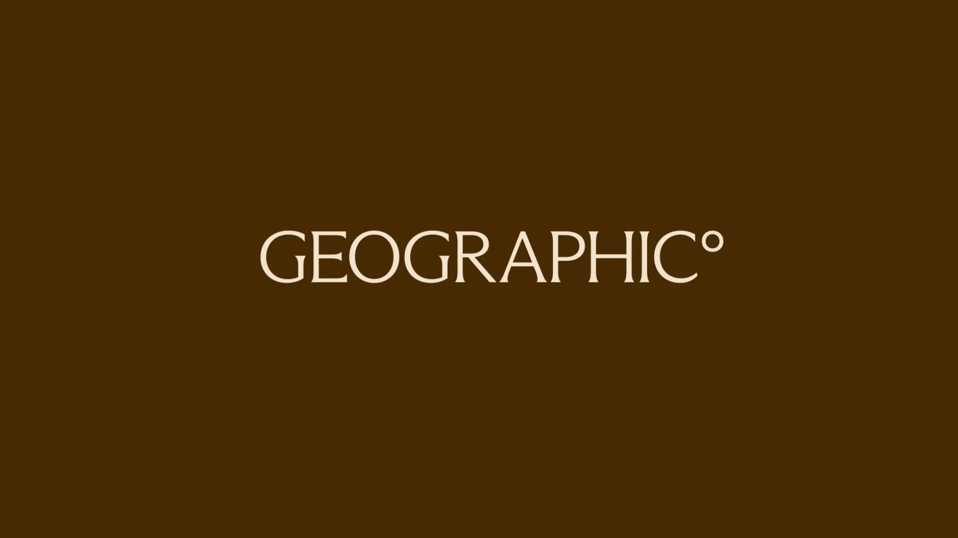 The Geographic wordmark with its degree symbol, in cream on brown