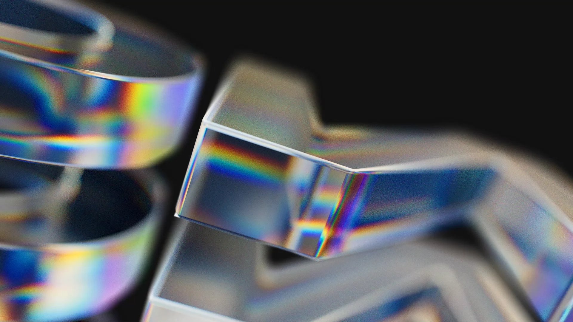 The Wow Media W rendered as twisting iridescent glass ribbons on black
